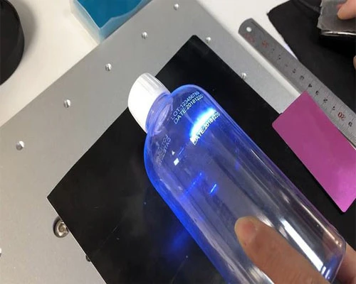 Laser marking bottles